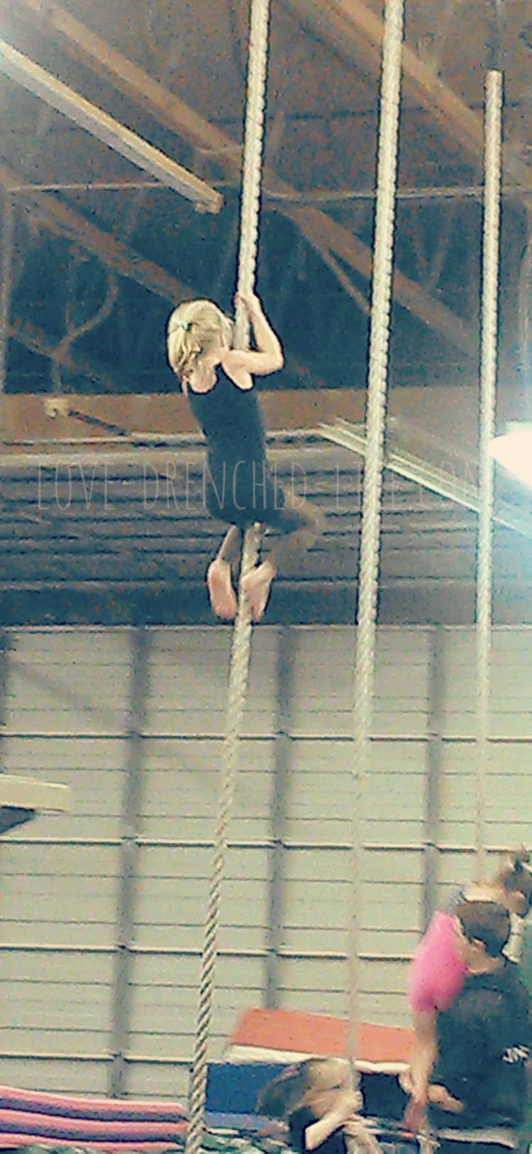 This photo is from another gymnastics class. Anna was the only student that had absolutely no problem climbing to the top of the rope. No fear and so strong.